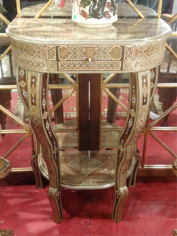 ANTIQUE MOROCCAN INLAID CONSOLE TABLE, INTRICATELY HAND: ANTIQUE MOROCCAN INLAID CONSOLE TABLE, INTRICATELY HAND CARVED MOTHER OF PEARL AND BONE INLAY, SINGLE DRAWER, UNDERTIER, EXCELLENT GENTLY USED CONDITION, APPROX 20"W X 30"H X 14"D, SKU560.03
