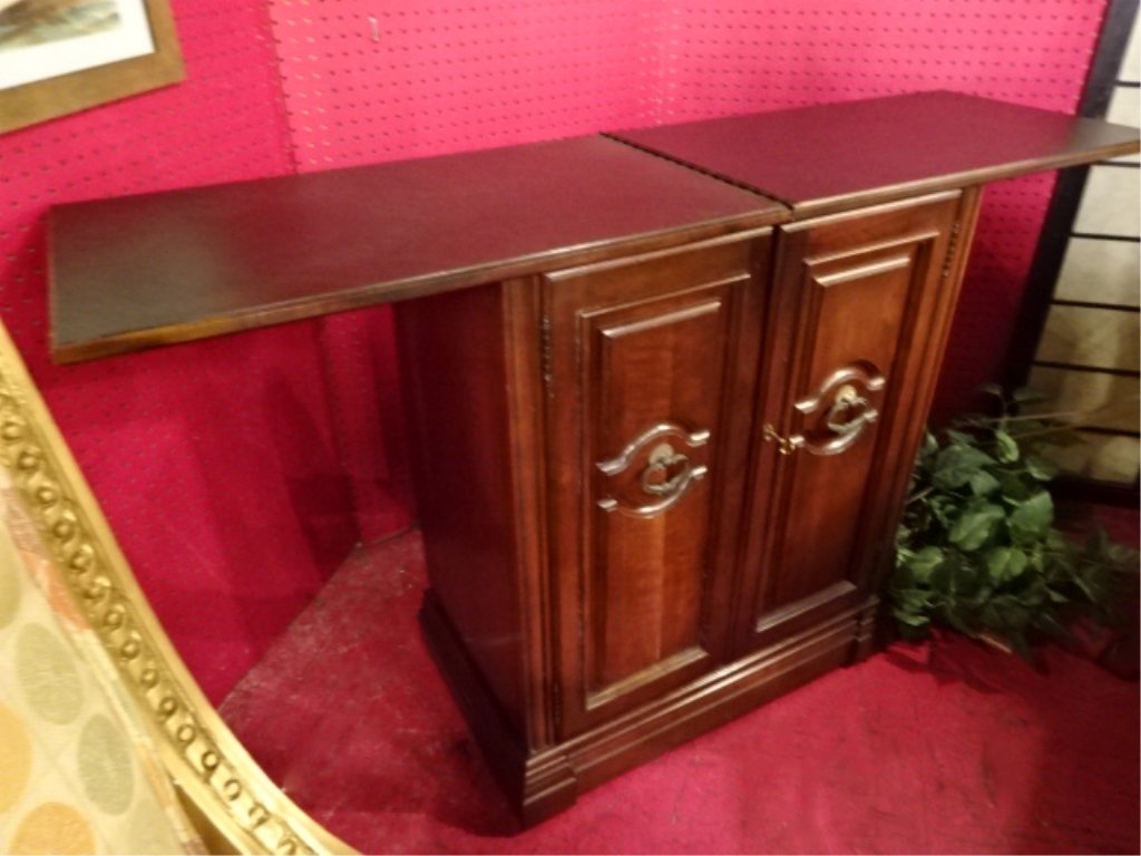 FRUITWOOD BAR CABINET BY JASPER CABINET, EXPANDING TOP,: FRUITWOOD BAR CABINET BY JASPER CABINET, EXPANDING TOP, 2 DOORS WITH GLASSWARE RACKS, LABELED JASPER CABINET, APPROX 2'W, TOP EXTENDS TO APPROX 3.75'W