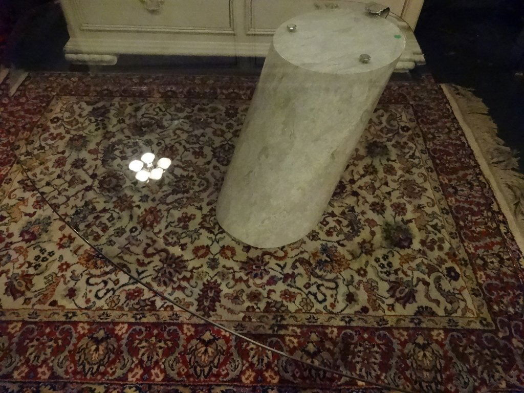 RONALD SCHMITT BRUETON CANTILEVERED COFFEE TABLE, CIRCA: RONALD SCHMITT BRUETON CANTILEVERED COFFEE TABLE, CIRCA 1970, CYLINDRICAL CANTILEVER MARBLE BASE, NEWER FAN SHAPE BEVELED GLASS TOP (ORIGINAL GLASS TOP WAS OVAL), MARBLE IS IN VERY GOOD VINTAGE CONDIT