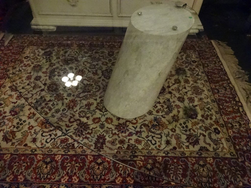 RONALD SCHMITT BRUETON CANTILEVERED COFFEE TABLE, CIRCA: RONALD SCHMITT BRUETON CANTILEVERED COFFEE TABLE, CIRCA 1970, CYLINDRICAL CANTILEVER MARBLE BASE, NEWER FAN SHAPE BEVELED GLASS TOP (ORIGINAL GLASS TOP WAS OVAL), MARBLE IS IN VERY GOOD VINTAGE CONDIT