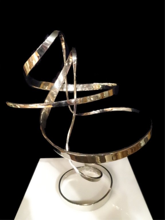 CLAYTON WHITEHOUSE CHROME STEEL KINETIC SCULPTURE, 3: CLAYTON WHITEHOUSE CHROME STEEL KINETIC SCULPTURE, 3 BALANCED PIECES THAT MOVE FREELY, TITLED ORBIT, SIGNED CLAYTON AND DATED '91 ON BASE, EXCELLENT CONDITION, 19"H, APPRAISED IN NOVEMBER 2013 BY APPR