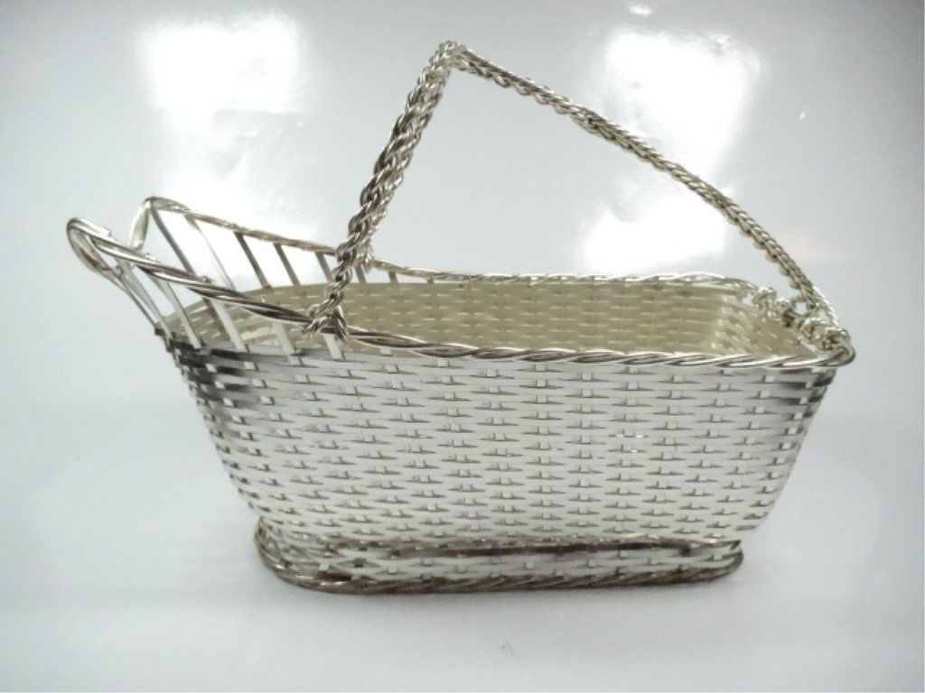 CHRISTOFLE FRANCE SILVERPLATE WINE BOTTLE BASKET,: CHRISTOFLE FRANCE SILVERPLATE WINE BOTTLE BASKET, GALLIA COLLECTION, APPROX 7" X 9.5"