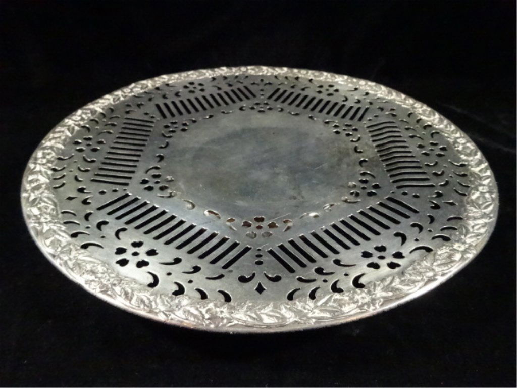 VINTAGE J. E. CALDWELL STERLING SILVER ROUND TRIVET: VINTAGE J. E. CALDWELL STERLING SILVER ROUND TRIVET WITH PEDESTAL BASE, MARKED J.E. CALDWELL PHILADELPHIA, 925/1000 & A337, APPROX 33 GRAMS STERLING WEIGHT, APPROX 9.75" DIAMETER