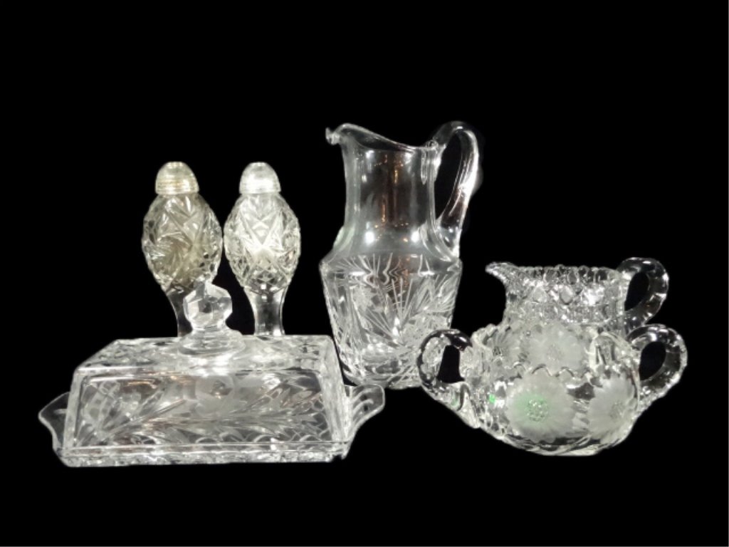 6 PC CRYSTAL SERVEWARE, INCLUDES PITCHER, COVERED: 6 PC CRYSTAL SERVEWARE, INCLUDES PITCHER, COVERED BUTTER DISH, CREAMER, OPEN SUGAR, AND SALT AND PEPPER SHAKERS, PITCHER APPROX 7.75"H