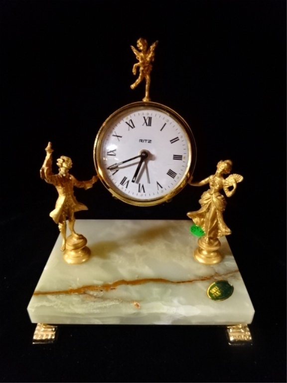 ONYX AND GILT METAL FIGURAL CLOCK, MADE IN ITALY,: ONYX AND GILT METAL FIGURAL CLOCK, MADE IN ITALY, EXCELLENT CONDITION, 7" X 5" X 4", SKU843.03