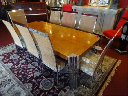 MILO BAUGHMAN DINING TABLE WITH 8 MILO BAUGHMAN 4: MILO BAUGHMAN DINING TABLE WITH 8 MILO BAUGHMAN 4 CHROME CHAIRS (4 ARMCHAIRS, 4 SIDE CHAIRS), TABLE IS MILO BAUGHMAN FOR PACE, WITH BURL WOOD TOP, CHROME LEGS, AND 2 LEAVES, CHAIRS ARE MILO BAUGHMAN F