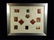 11 FRAMED RUSSIAN PINS, INCLUDES SEVERAL FROM MOSCOW