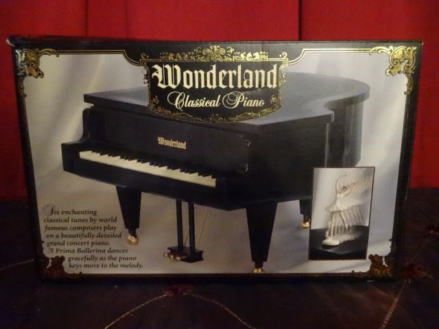 MUSIC BOX PIANO AND DANCER, IN ORIGINAL BOX, 9" X 10" X: MUSIC BOX PIANO AND DANCER, IN ORIGINAL BOX, 9" X 10" X 6", SKU950.22 BX 98