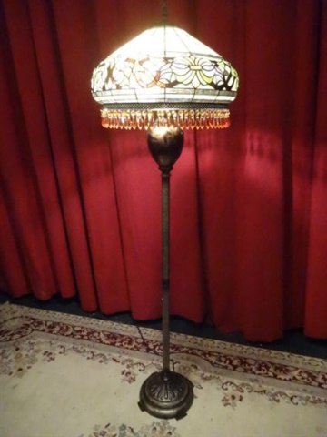 TIFFANY STYLE LEADED GLASS FLOOR LAMP, DOME SHADE WITH: TIFFANY STYLE LEADED GLASS FLOOR LAMP, DOME SHADE WITH BEADED FRINGE, ART NOUVEAU STYLE METAL BASE, EXCELLENT NEW CONDITION, WITH ORIGINAL BOX FOR SHIPPING, APPROX 65"H X 20"W. SKU773.14
