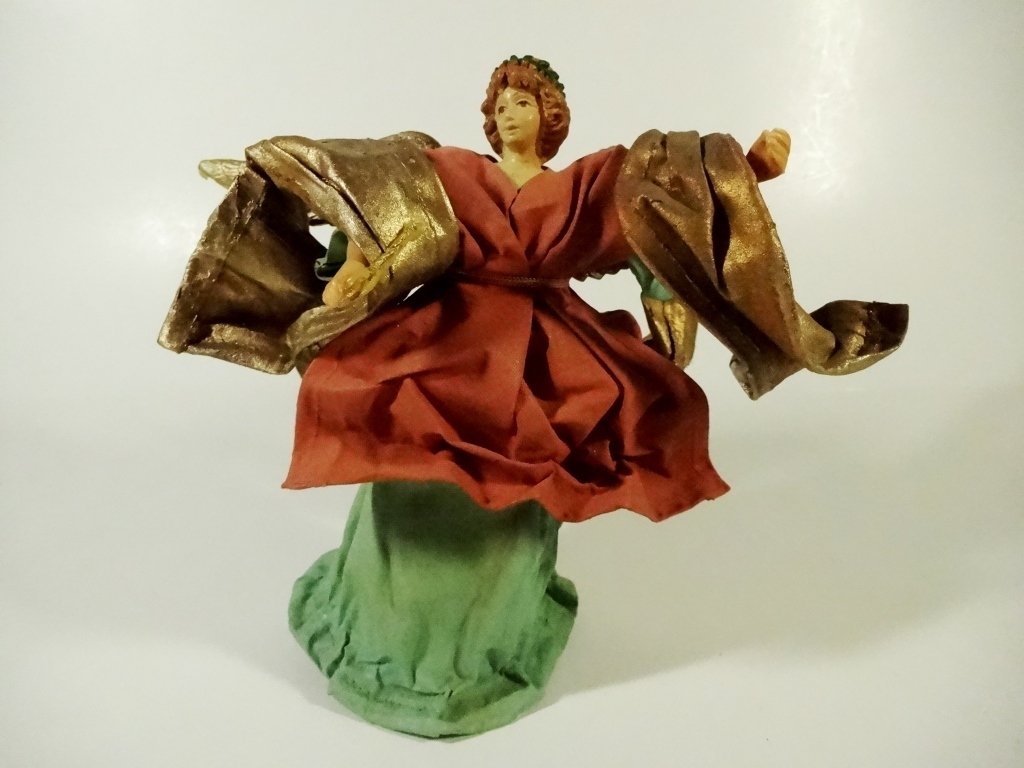 CHRISTMAS DECOR - ANGEL ON STAND / TREE TOPPER, GREEN: CHRISTMAS DECOR - ANGEL ON STAND / TREE TOPPER, GREEN BASE, RED TUNIC, STIFFENED FABRIC ROBES, APPROX 7"