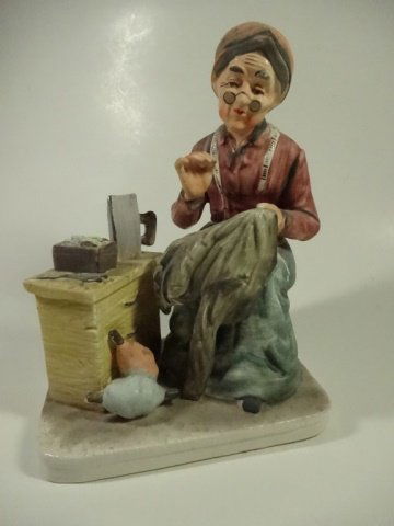 PORCELAIN FIGURINE, OLD WOMAN SEWING, APPROX 8" X 6" (1 of 5)