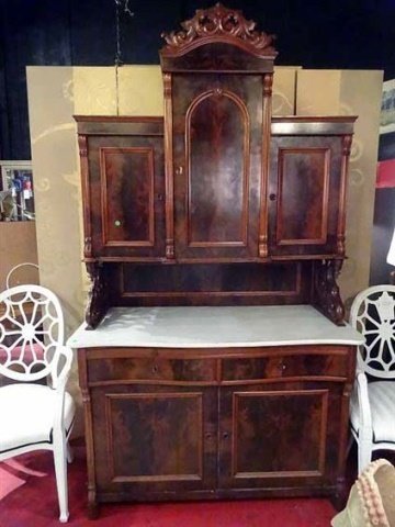 MAHOGANY MARBLE TOP HUTCH, 3 CABINETS ABOVE LOWER: MAHOGANY MARBLE TOP HUTCH, 3 CABINETS ABOVE LOWER CABINET WITH 2 DRAWERS AND 2 DOOR CABINET, CARVED WOOD CREST, VERY GOOD CONDITION COMMENSURATE WITH AGE, 3 WOOD ESCUTCHEONS NEED REPLACEMENT, OTHERWIS