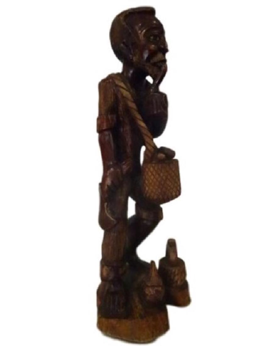 LARGE CARVED WOOD SCULPTURE, MALE FIGURE WITH MACHETE (1 of 7)