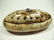 OVAL CARVED BONE BOX WITH BRASS INLAY, APPROX 6 1/8" X - 4