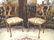 PAIR ORNATE WOOD CHAIRS, CARVED FEMALE BUSTS ON SEAT