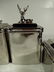4 PC DECORATIVE METAL CANISTERS, RECLINING STAG - 4