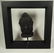 BUDDHA HEAD SCULPTURE, COMPOSITE, IN BLACK FRAME,