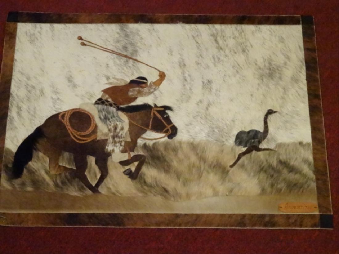 ARGENTINE COWHIDE ART PANEL, HUNTER ON HORSEBACK: ARGENTINE COWHIDE ART PANEL, HUNTER ON HORSEBACK CHASING OSTRICH RHEA BIRD, VERY GOOD CONDITION, 27" X 19.5", SKU022.05