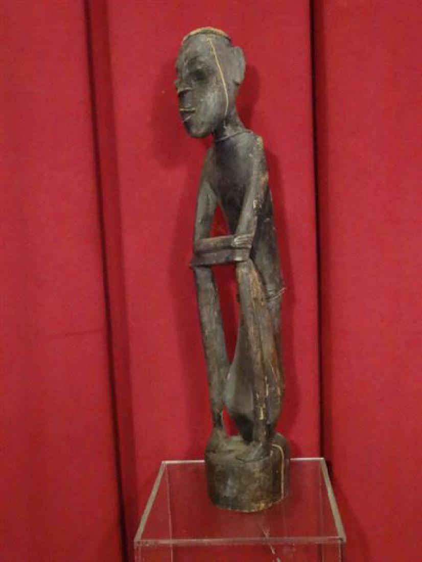 AFRICAN CARVED WOOD SCULPTURE, SEATED FIGURE, 23" X 5", (1 of 5)