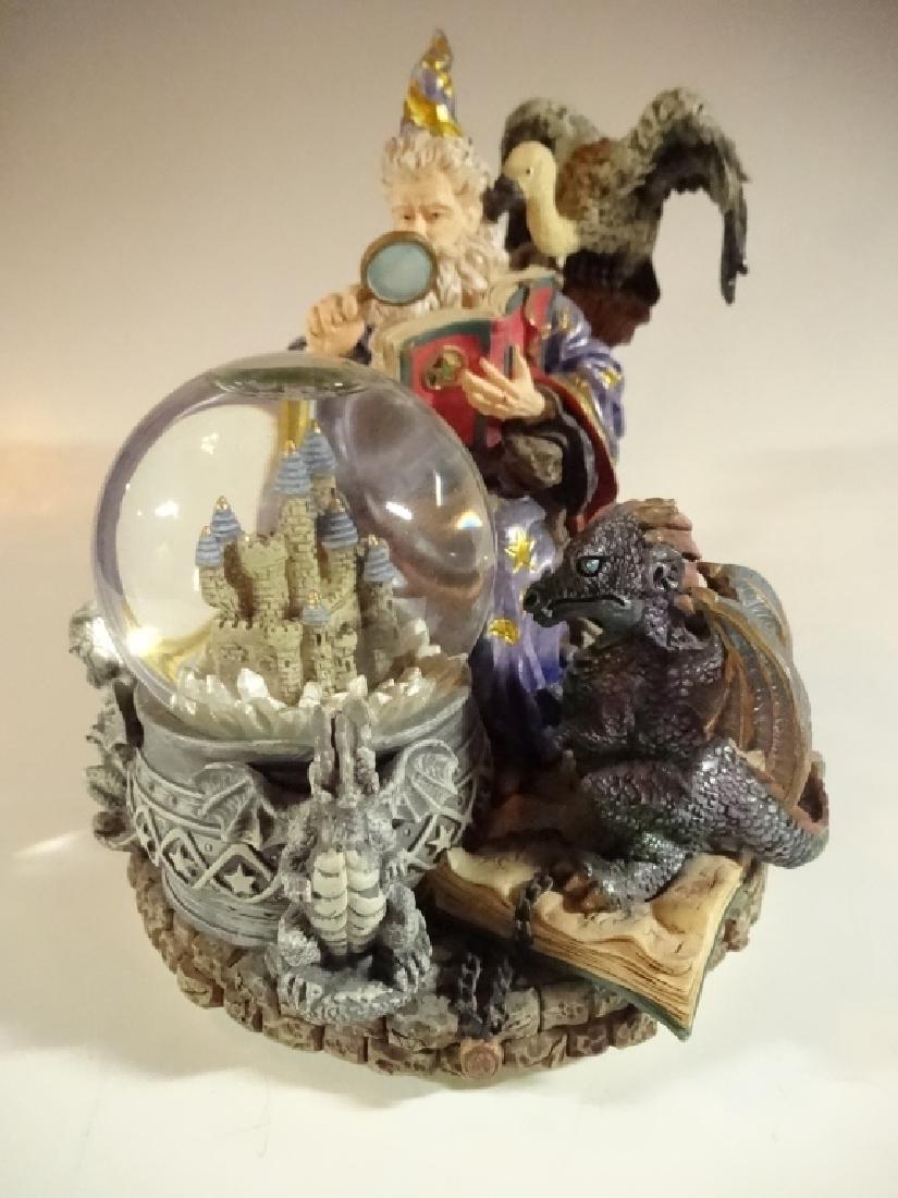 MUSICAL WIZARD AND DRAGON SNOWGLOBE, PLAYS CAMELOT,: MUSICAL WIZARD AND DRAGON SNOWGLOBE, PLAYS CAMELOT, APPROX 6" X 5", SKU199