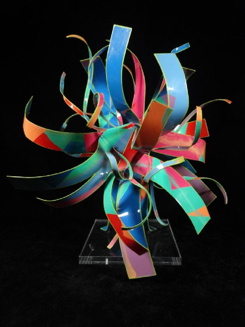 DOROTHY GILLESPIE (AMERICAN 1920-2012), STARBURST: DOROTHY GILLESPIE (AMERICAN 1920-2012), STARBURST SCULPTURE, PINK, GREEN & MULTICOLOR ENAMELED ALUMINUM RIBBONS ON LUCITE BASE, WITH LABEL: "AN ORIGINAL WORK BY DOROTHY GILLESPIE, AUTHENTICATED BY HER