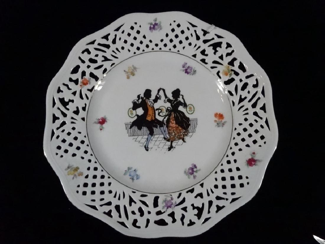 BAVARIAN RETICULATED PORCELAIN PLATE, PAINTED COUPLE IN: BAVARIAN RETICULATED PORCELAIN PLATE, PAINTED COUPLE IN SILHOUETTE, EARLY 20TH C., MARKED WITH CROWN AND BAVARIA GERMANY, 10"W, SKU5191.10