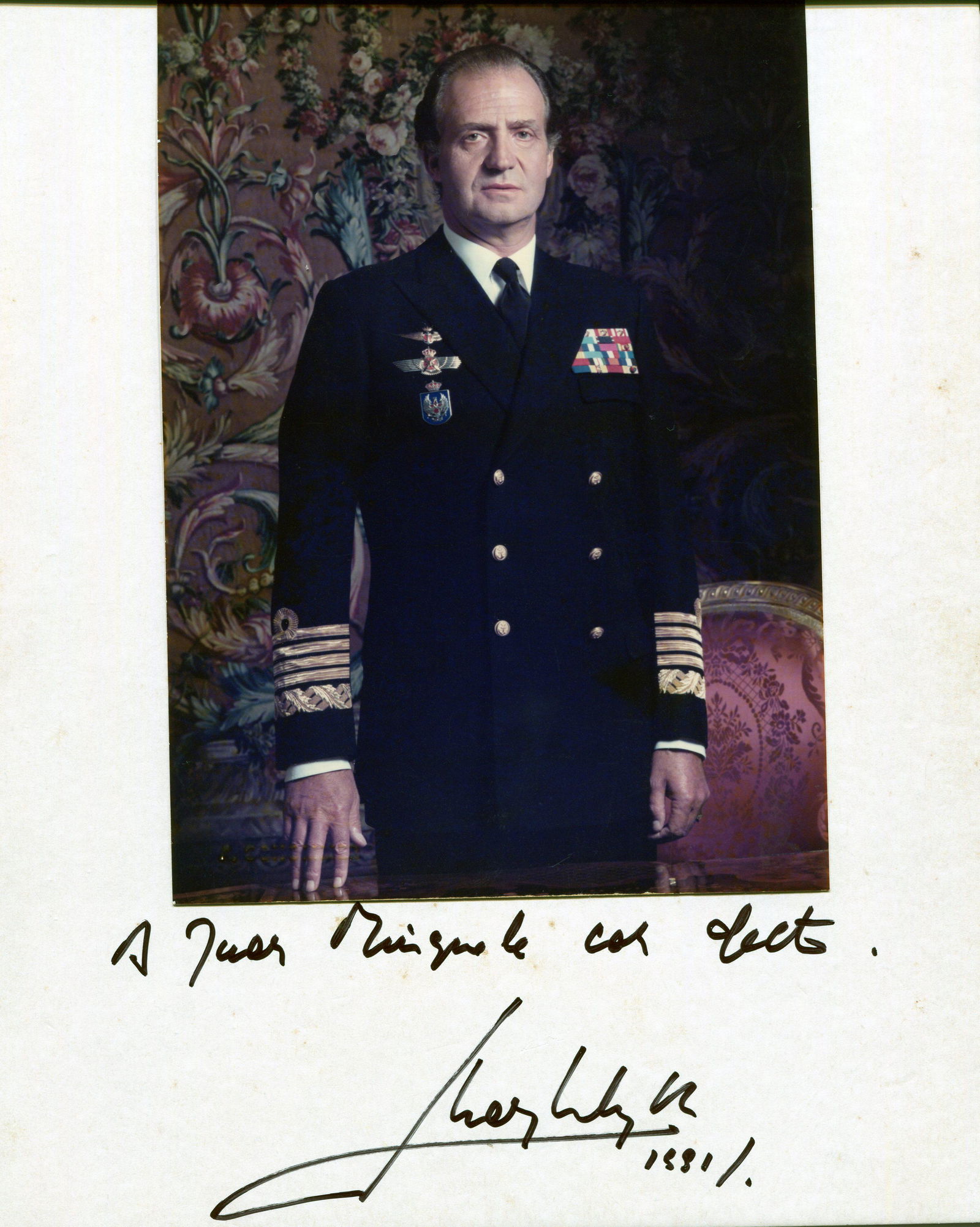JUAN CARLOS I: (1938- ): JUAN CARLOS I: (1938- ) King of Spain 1975-2014. Colour signed and inscribed 7.5 x 10.5 photograph, the image depicting King Juan Carlos standing in half-length pose, wearing his uniform. Boldly signe
