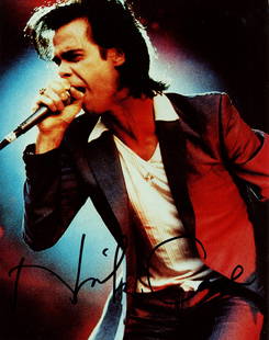 CAVE NICK: (1957- ): CAVE NICK: (1957- ) Australian musician, frontman of the rock band Nick Cave and the Bad Seeds. Signed colour 8 x 10 photograph of Cave in a half-length pose singing into a microphone during a perform