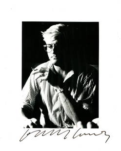 HOCKNEY DAVID: (1937- ): HOCKNEY DAVID: (1937- ) HOCKNEY DAVID: (1937- ) English painter, an important contributor to the pop art movement in the 1960s. Signed 8 x 10 photograph of Hockney in a comtemplative half-length pose