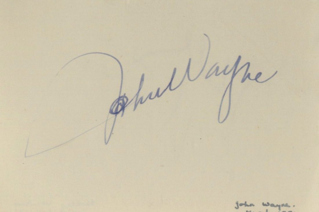 WAYNE JOHN: (1907-1979) American Actor, Academy Aw: WAYNE JOHN: (1907-1979) American Actor, Academy Award winner. Bold blue fountain pen ink signature ('John Wayne') on a page removed from an autograph album. Neatly annotated and dated March 1951 in th