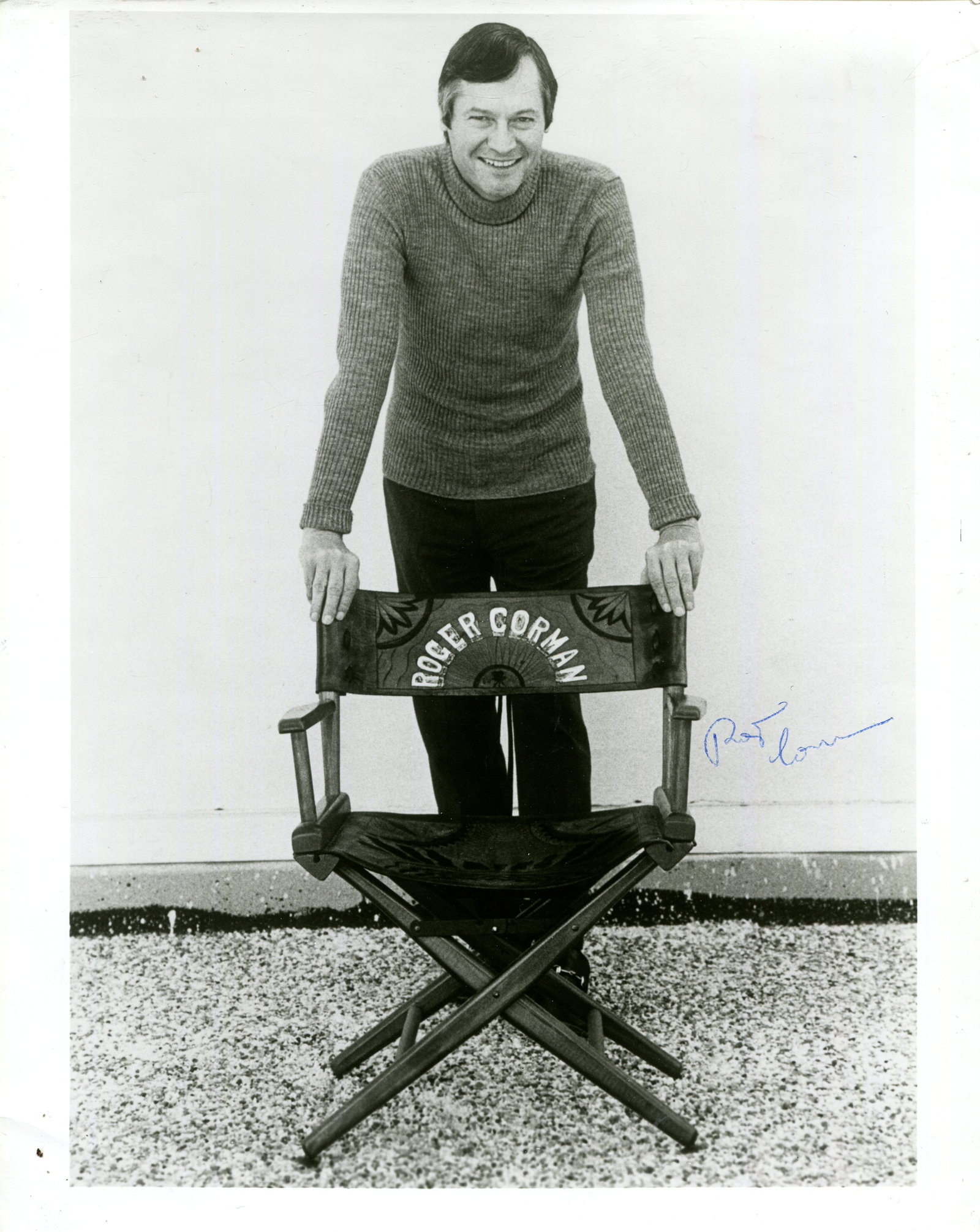 CORMAN ROGER: (1926-2024): CORMAN ROGER: (1926-2024) American film director, many of whose movies attracted a cult following. Signed 8 x 10 photograph of the director standing in a full-length pose behind his director´s chair