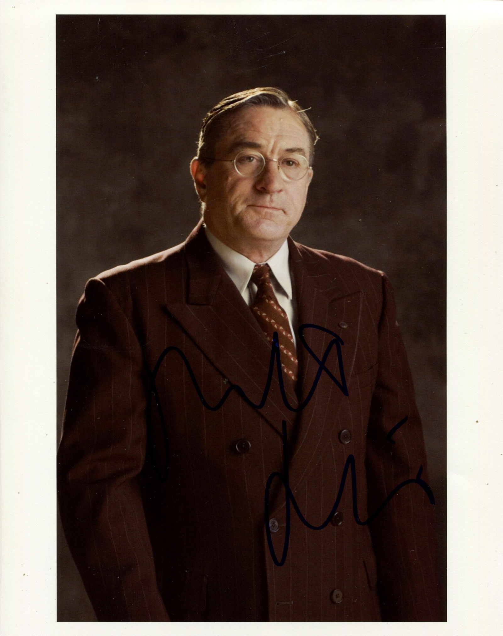 DE NIRO ROBERT: (1943- ): DE NIRO ROBERT: (1943- ) American actor, Academy Award winner. Signed colour 8 x 10 photograph of the actor standing in a half-length pose in costume as General Bill Sullivan from the American spy fil