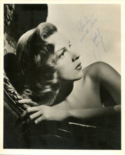 GARLAND JUDY: (1922-1969): GARLAND JUDY: (1922-1969) American actress and singer, Academy Award winner. A fine vintage signed and inscribed 8 x 10 photograph of Garland in an appealing semi-profile head and shoulders pose. Sign