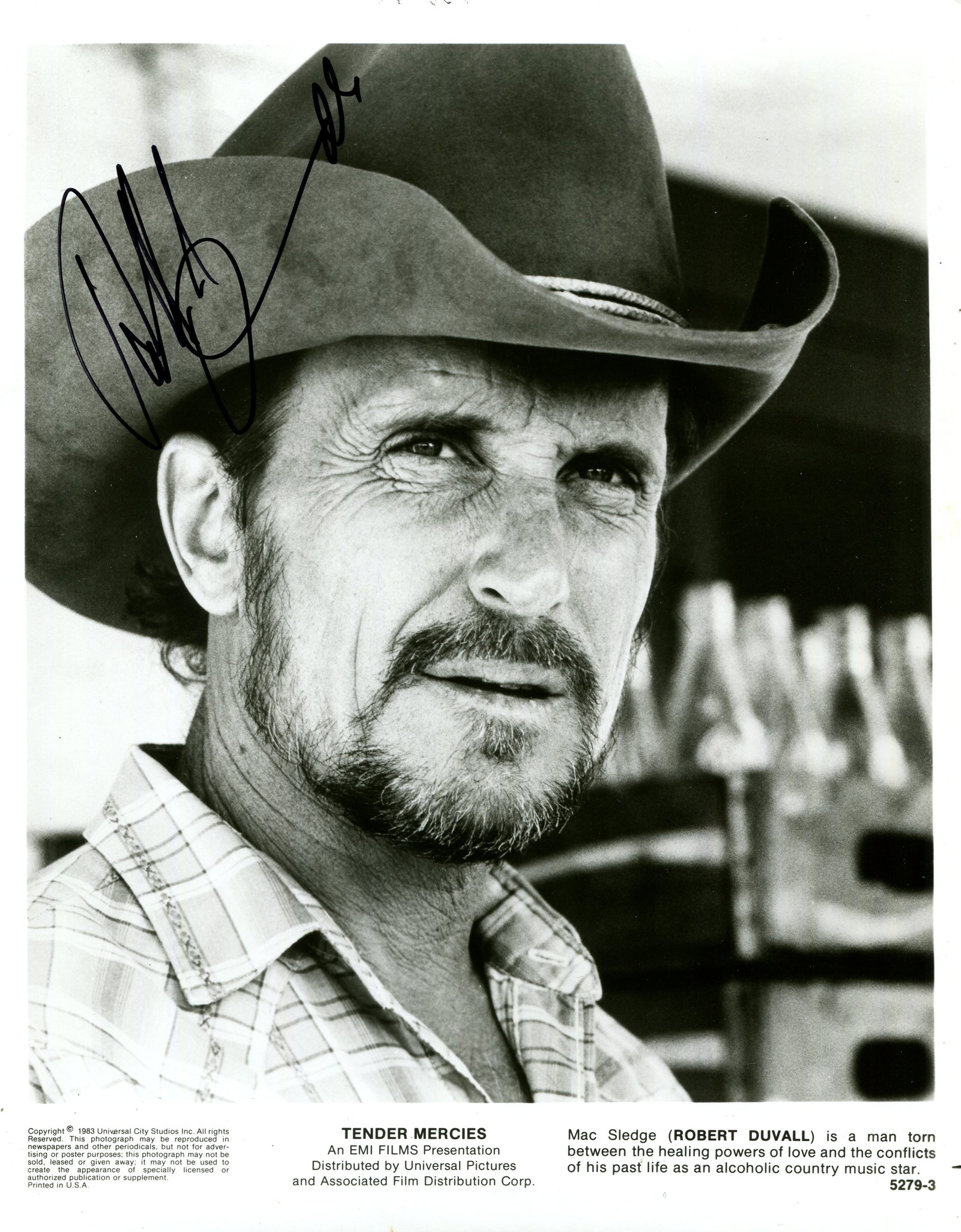 DUVALL ROBERT: (1931- ): DUVALL ROBERT: (1931- ) American actor, Academy Award winner for Best Actor in 1983 for his role as Mac Sledge in Tender Mercies. Signed 8 x 10 photograph of Duvall in a head and shoulders pose in cos