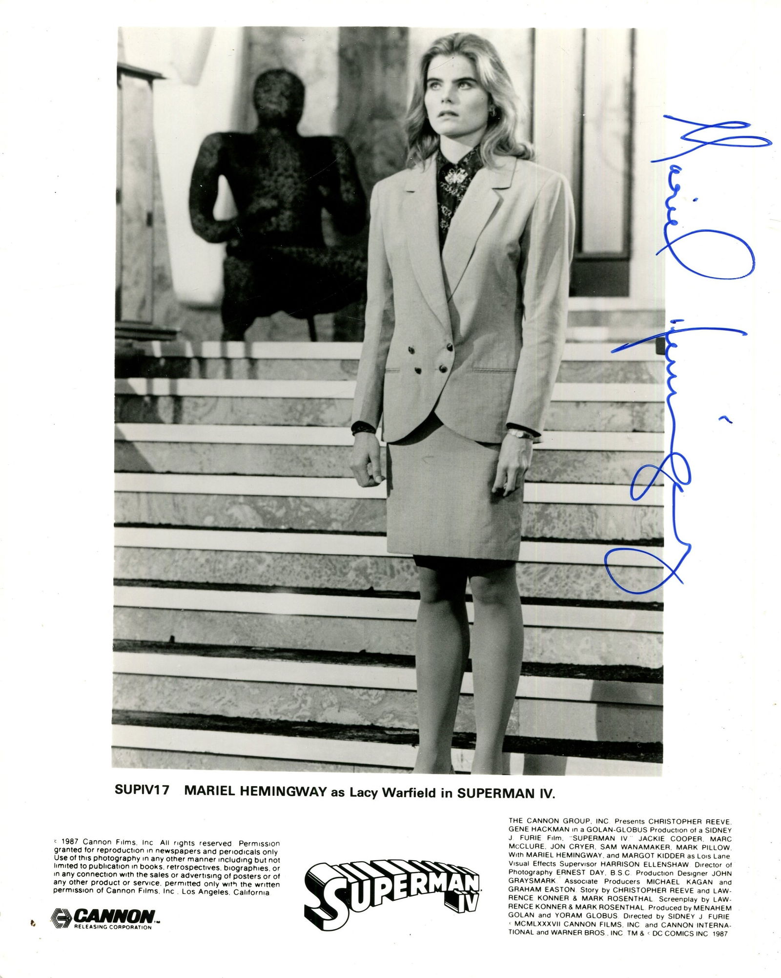 HEMINGWAY MARIEL: (1961- ): HEMINGWAY MARIEL: (1961- ) American actress. Signed 8 x 10 photograph of the actress standing in a full-length pose in costume as Lacy Warfield from the superhero film Superman IV: The Quest for Peace