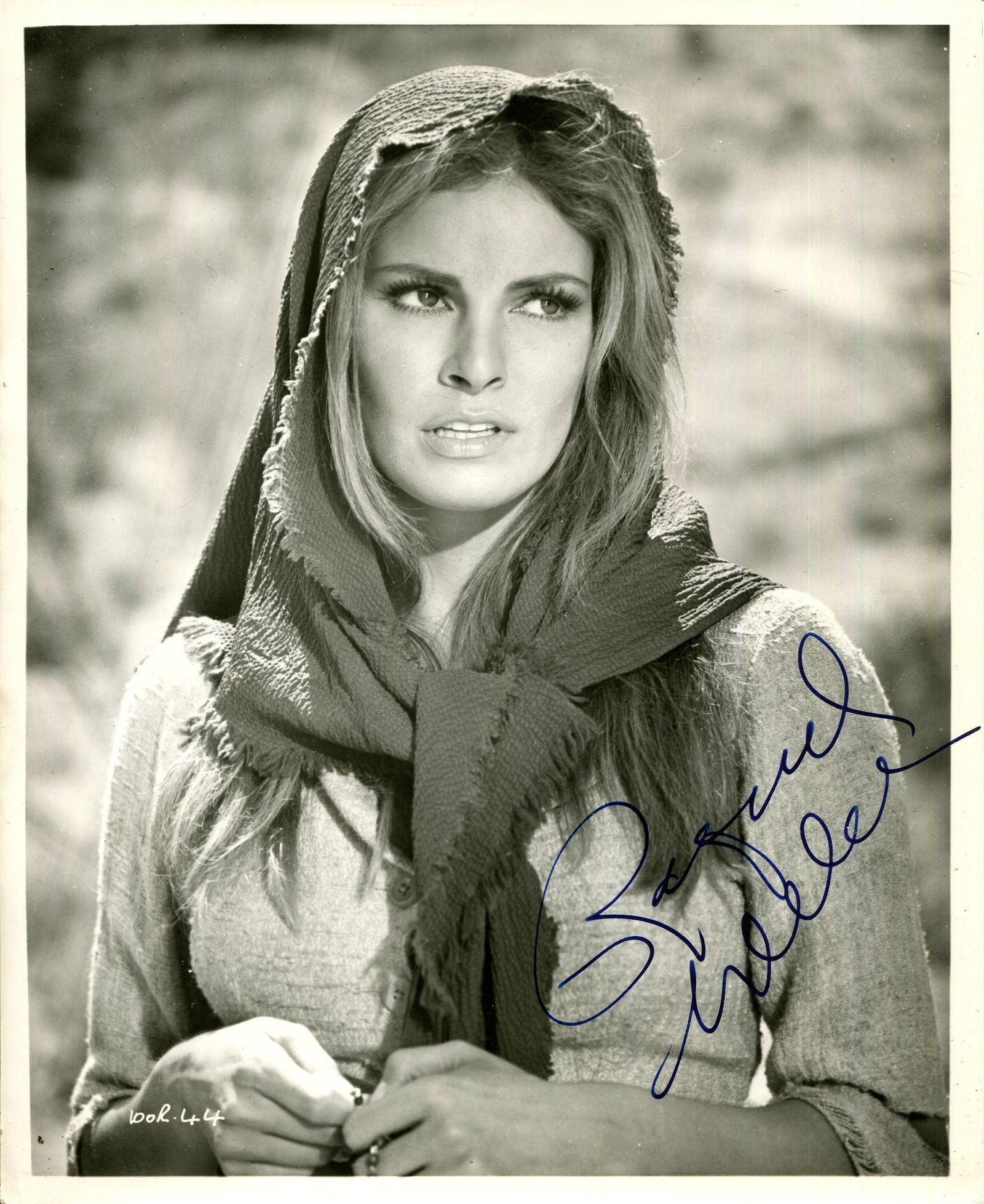 WELCH RAQUEL: (1940-2023): WELCH RAQUEL: (1940-2023) American actress. Signed 8 x 10 photograph of Welch standing in a half-length pose in costume as Sarita from the American Western film 100 Rifles (1969). Signed by the actres