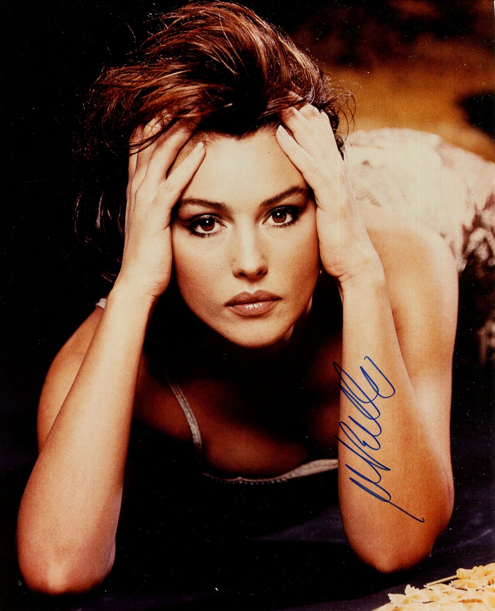 BELLUCCI MONICA: (1964- ): BELLUCCI MONICA: (1964- ) Italian Actress and fashion Model. A Bond Girl. Signed colour 8 x 10 photograph by Bellucci, the image depicting the actress and fashion model in a close-up head and