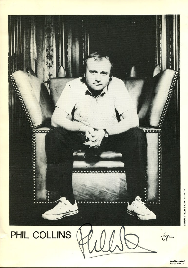 COLLINS PHIL: (1951- ): COLLINS PHIL: (1951- ) English drummer and singer with the rock band Genesis. Signed 6 x 8 promotional photograph of Collins seated in a full-length pose. Signed in black ink with his name alone to
