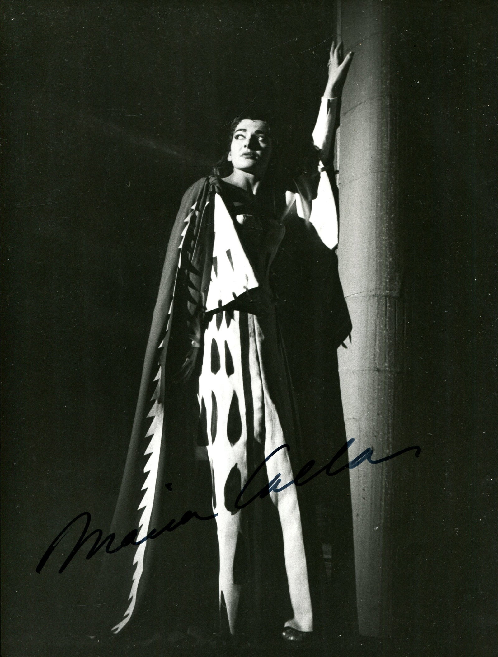 CALLAS MARIA: (1923-1977): CALLAS MARIA: (1923-1977) American-born Greek Soprano. A very fine vintage signed 7 x 9.5 photograph by Callas, the very attractive and large image depicting Callas standing in a full length pose, in