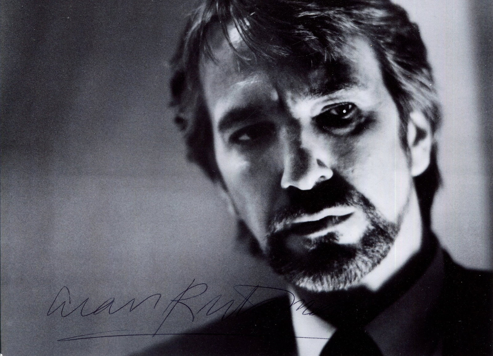 RICKMAN ALAN: (1946-2016): RICKMAN ALAN: (1946-2016) English Actor. Signed 7 x 5 photograph of Rickman, the attractive image showing Rickman in a head and shoulders pose in a film scene. Signed in bold dark ink with his name al