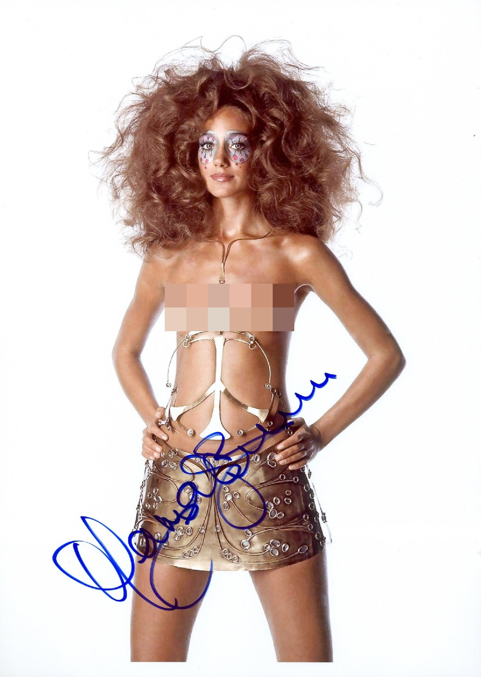 BERENSON MARISA: (1947- ): BERENSON MARISA: (1947- ) American Actress and Model. Signed colour 8 x 12 photograph of Berenson, the image showing the actress disguised, standing in a top less three quarter length pose. Signed in