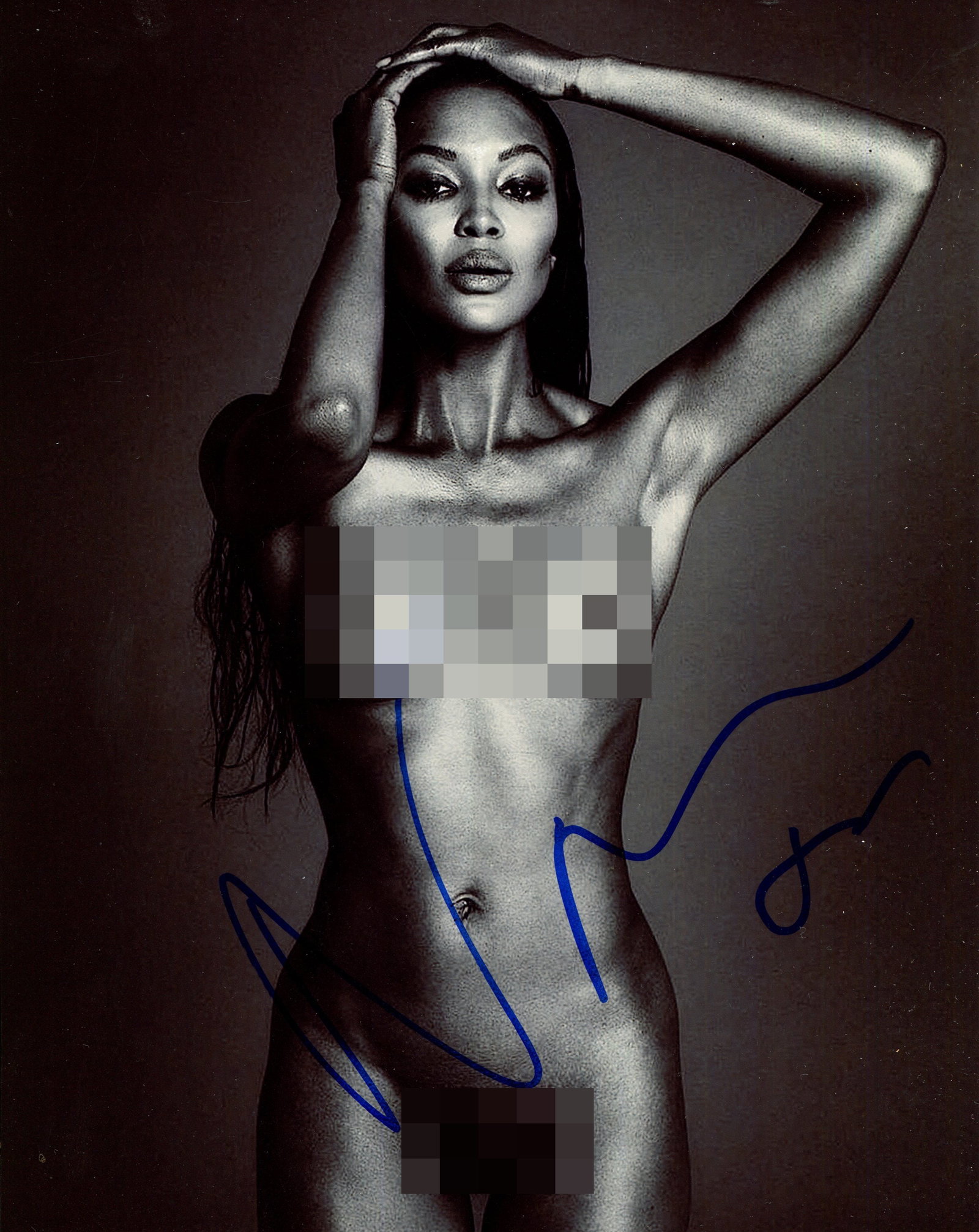 CAMPBELL NAOMI: (1970- ): CAMPBELL NAOMI: (1970- ) British model. Signed 8 x 10 photograph of Campbell standing in a naked three-quarter length pose. Signed in bold blue ink with her first name only, and with a typically