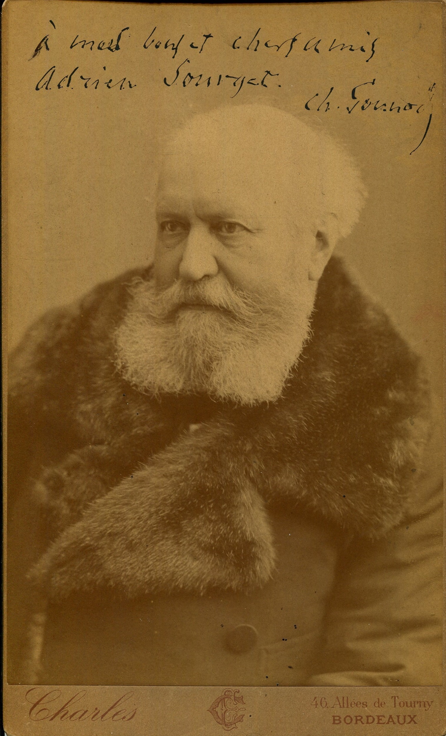 GOUNOD CHARLES: (1818-1893): GOUNOD CHARLES: (1818-1893) French Composer. A very fine signed and inscribed 5.5 x 8.5 sepia cabinet photograph, the Charles Chambon photograph from Bordeaux, shows Gounod in a half-length pose, wear
