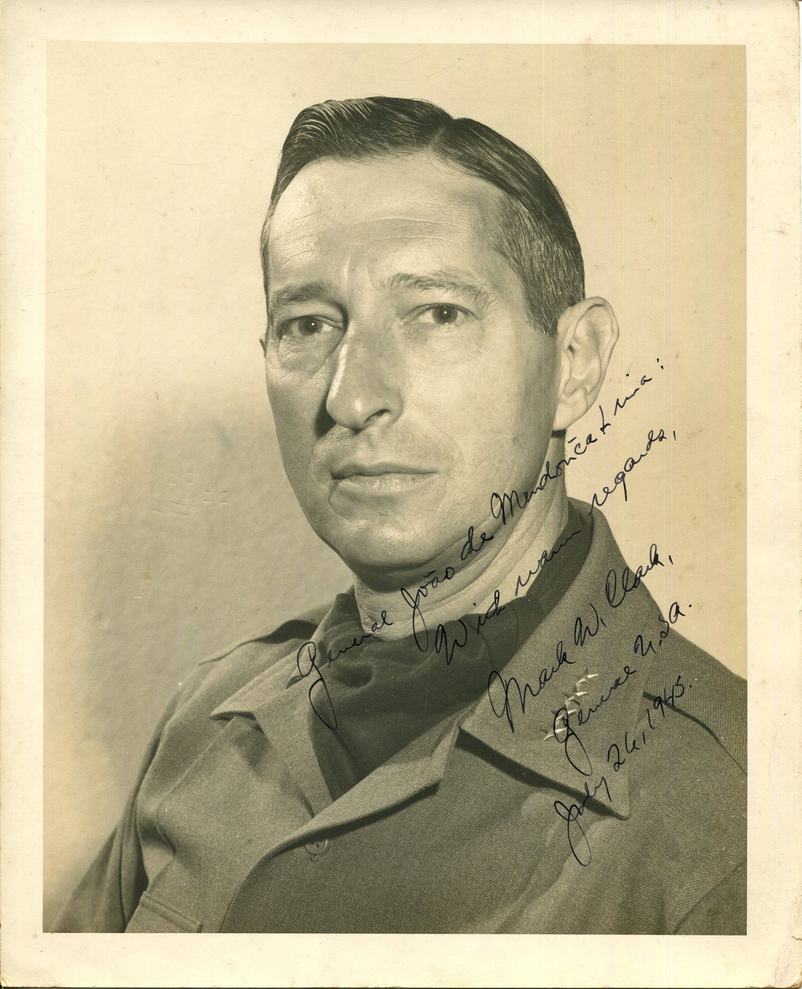 CLARK MARK W.: (1896-1984): CLARK MARK W.: (1896-1984) American General of World War II who also served in the Korean War. A good vintage World War II date signed and inscribed 8 x 10 photograph of Clark in a head and shoulders
