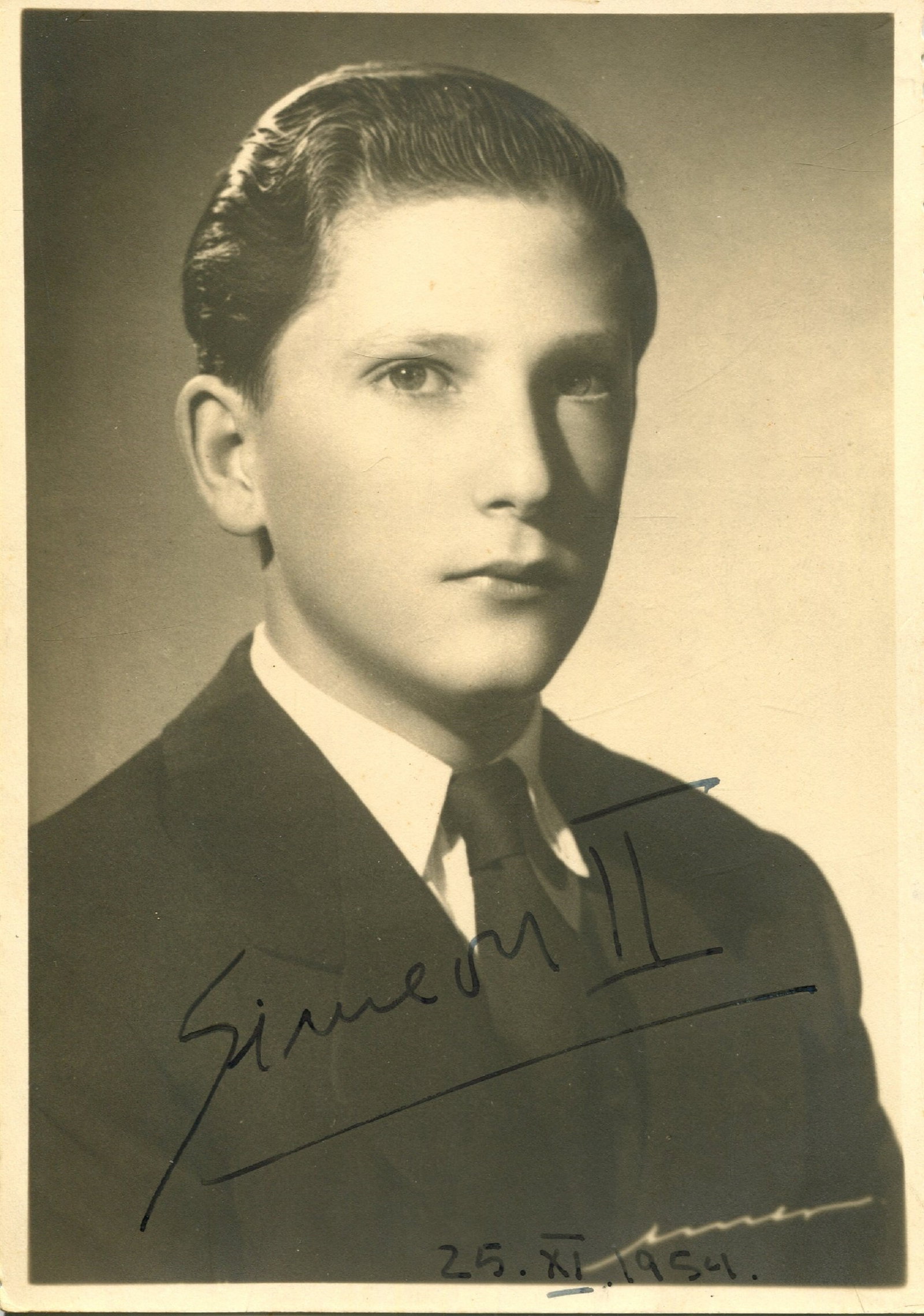 SIMEON II: (1937- ): SIMEON II: (1937- ) Tsar of Bulgaria 1943-46, later Prime Minister of Bulgaria 2001-05. Vintage signed 4 x 6 photograph by Simeon II, the image showing the 17 years old young Simeon exiled in Spain,