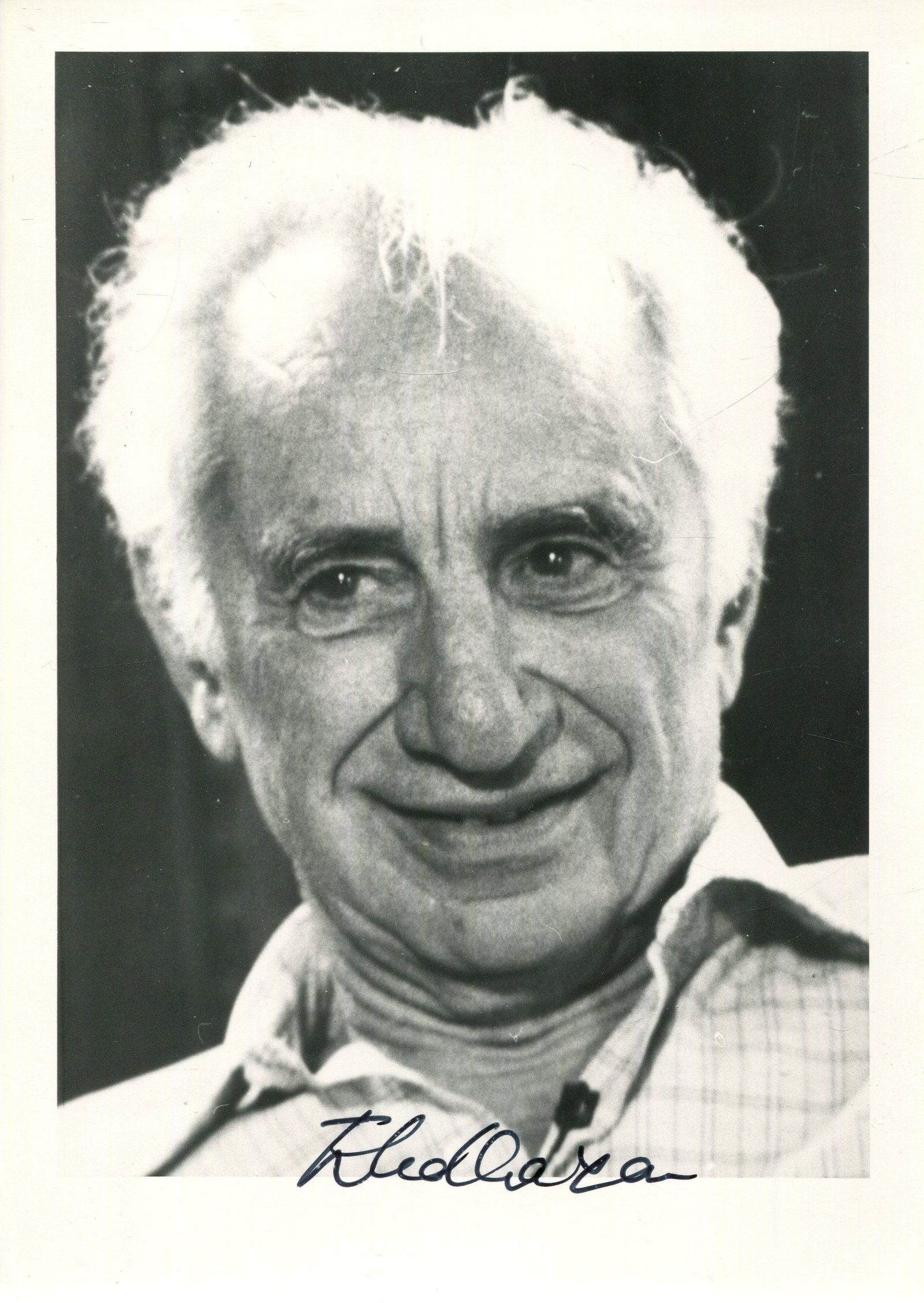 KAZAN ELIA: (1909-2003): KAZAN ELIA: (1909-2003) American film and theatre director, Academy Award winner. Signed 4 x 6 photograph of Kazan in a close-up head and shoulders pose. Signed in black ink with his name alone to a