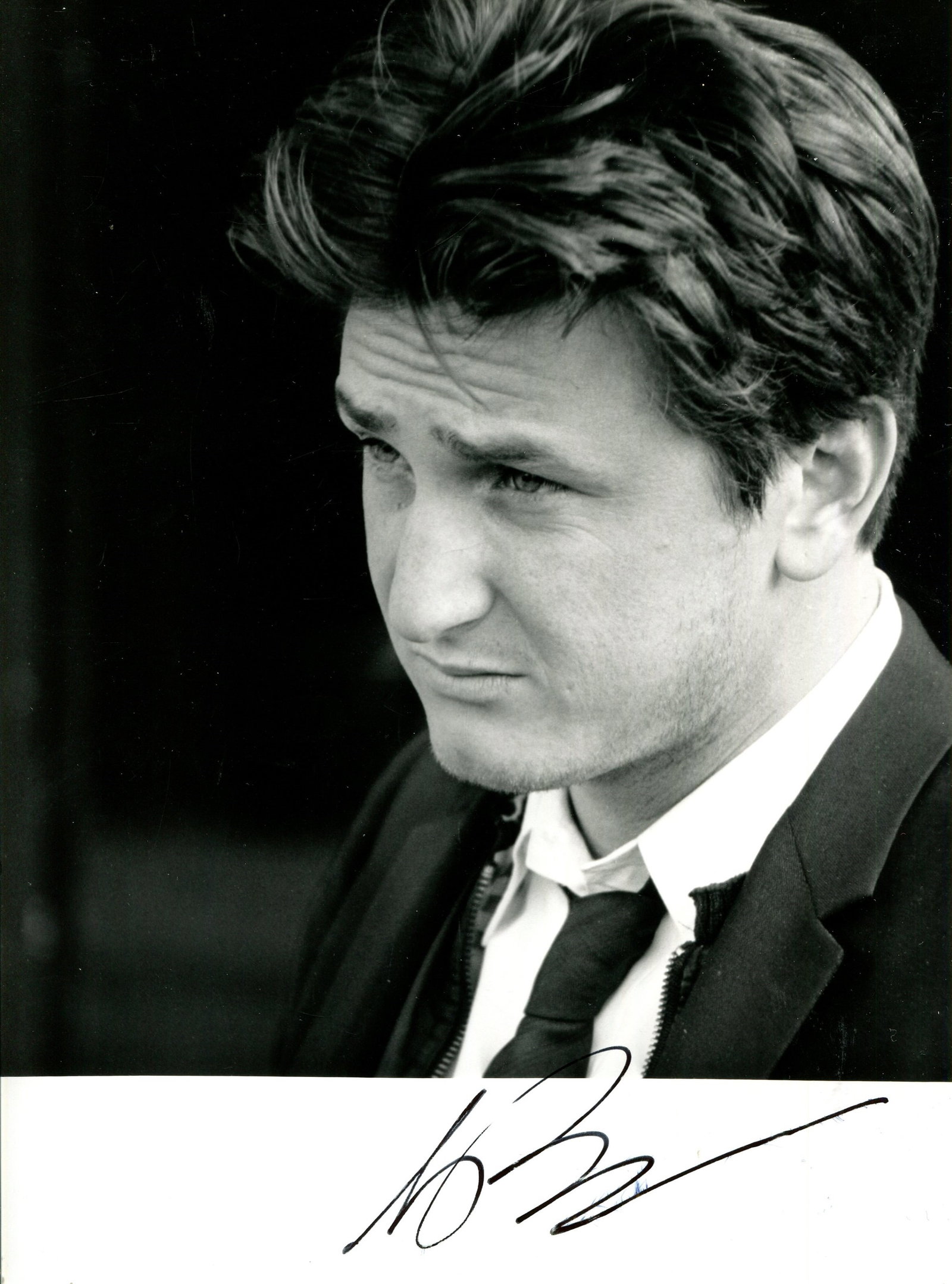 PENN SEAN: (1960- ): PENN SEAN: (1960- ) American Actor, Academy Award winner. Signed 7 x 9 photograph of Penn in a head and shoulders pose. Signed in black ink to the white lower border of the image, and with a