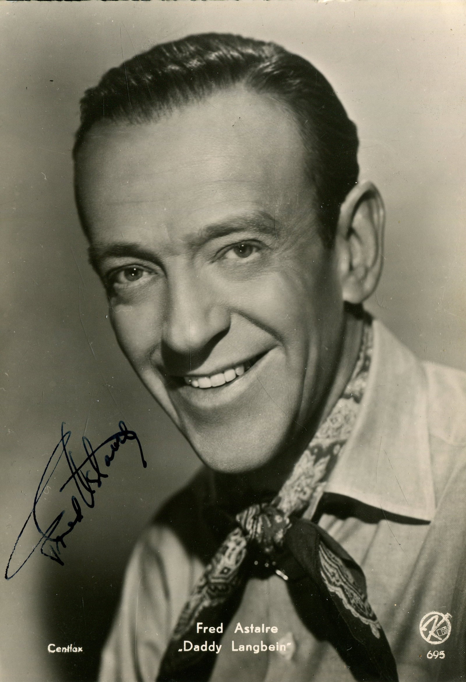 ASTAIRE & ROGERS:: ASTAIRE & ROGERS: Fred Astaire (1899-1987) American dancer and actor, the recipient of an Honorary Academy Award in 1950. Vintage signed 4 x 6 postcard photograph of Astaire in a smiling head and