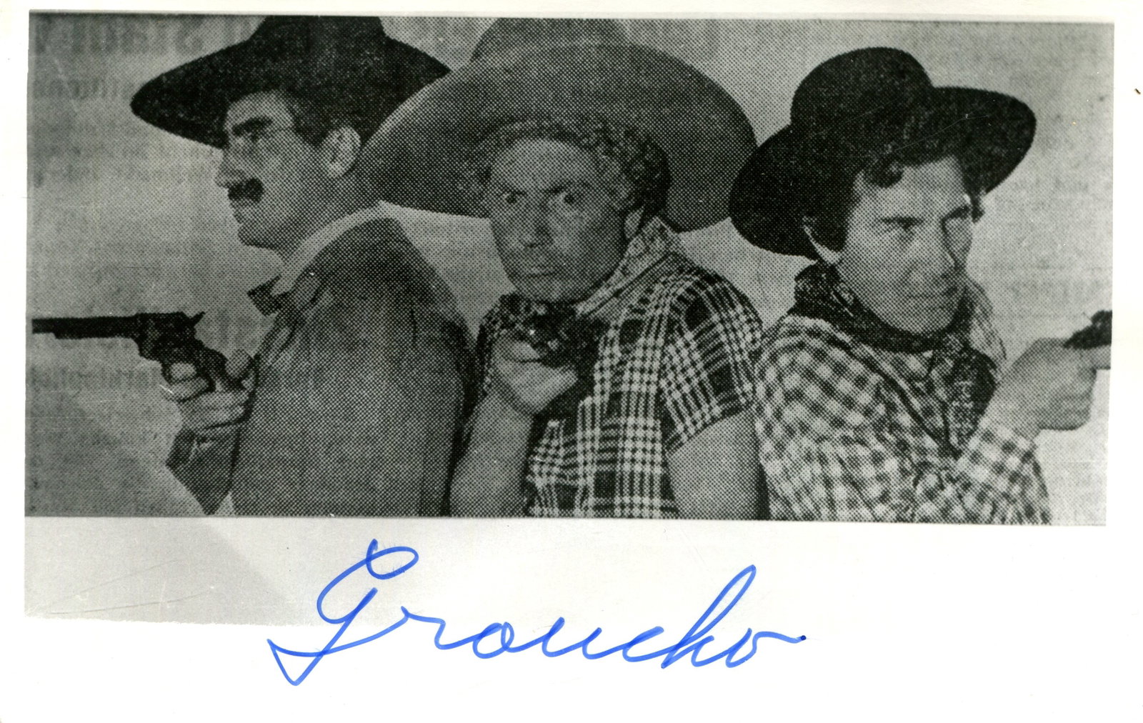 MARX GROUCHO: (1890-1977): MARX GROUCHO: (1890-1977) American film comedian, one of the Marx Brothers, and the recipient of an Honorary Academy Award in 1974. Signed 5.5 x 3.5 postcard photograph, the sligtly grainy image