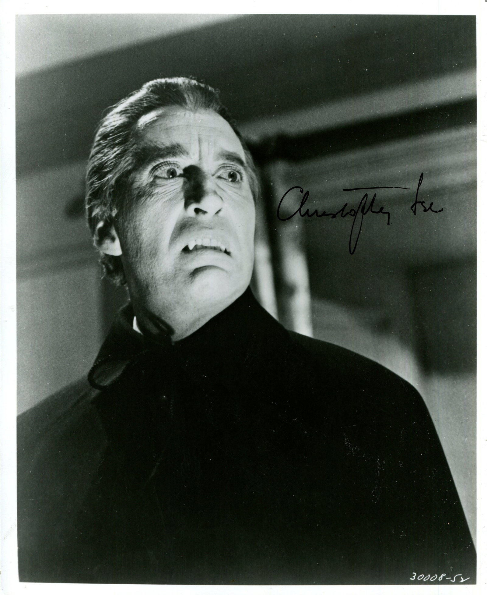 LEE CHRISTOPHER: (1922-2015): LEE CHRISTOPHER: (1922-2015) English actor who portrayed Count Dracula in seven Hammer Horror films. Signed 8 x 10 photograph of the actor in a chilling head and shoulders pose in costume as the